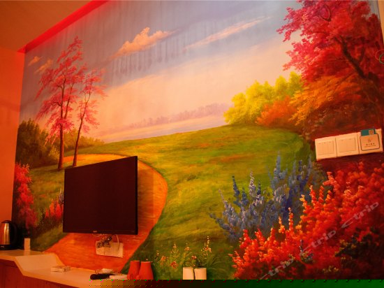 时尚蜜月圆床房