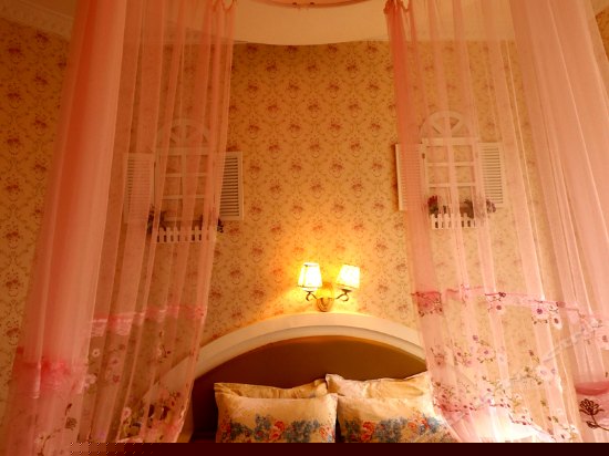 地中海情侣主题圆床房