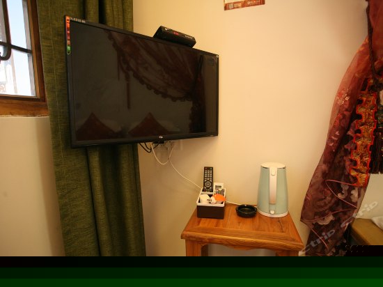 温馨纱幔二人土炕房