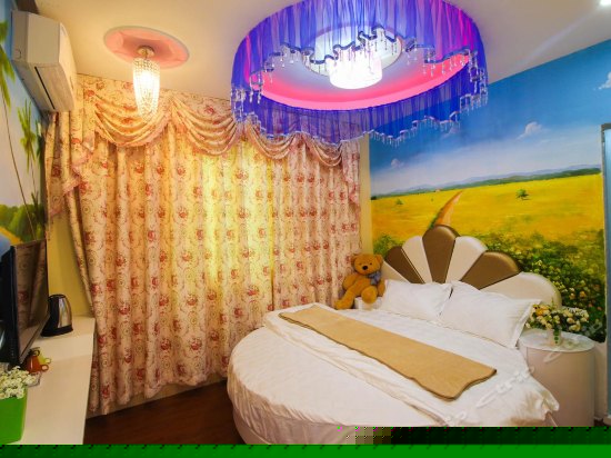 温馨浪漫圆床房