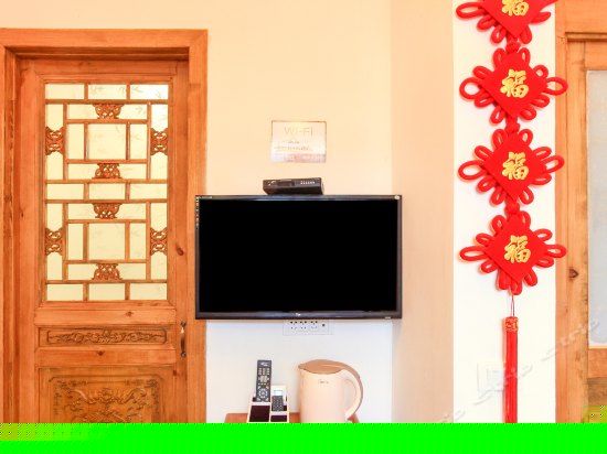 温馨四人大炕房