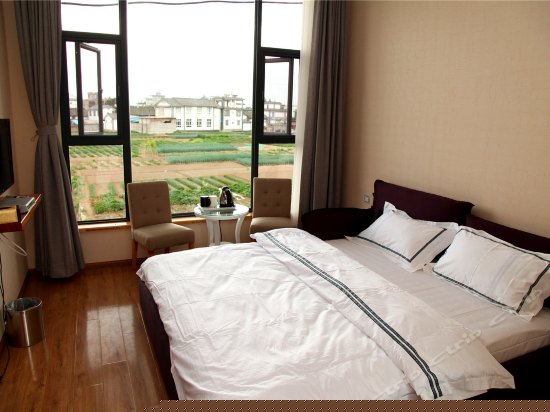 绿茵阁田园风光大床房