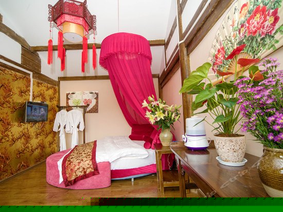 日晖（蜜月圆床套房）