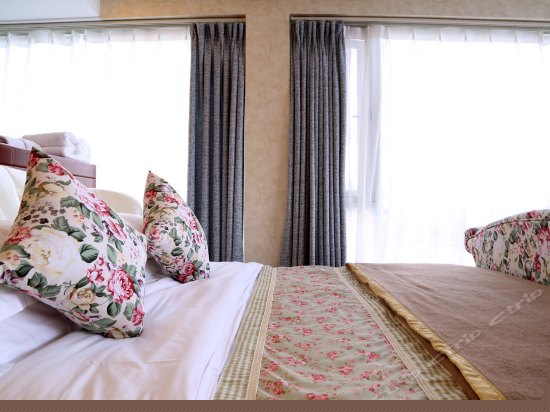 玫瑰绽放双海景豪华房