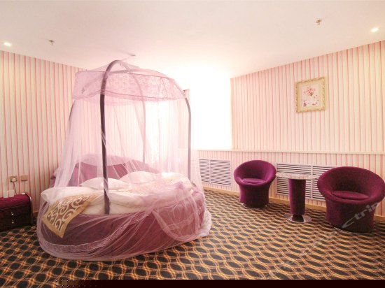 主题电动圆床房