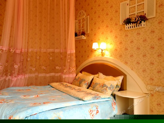 地中海情侣主题圆床房