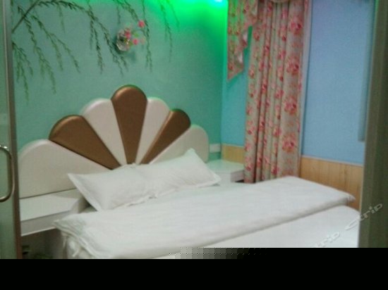 温馨浪漫圆床房