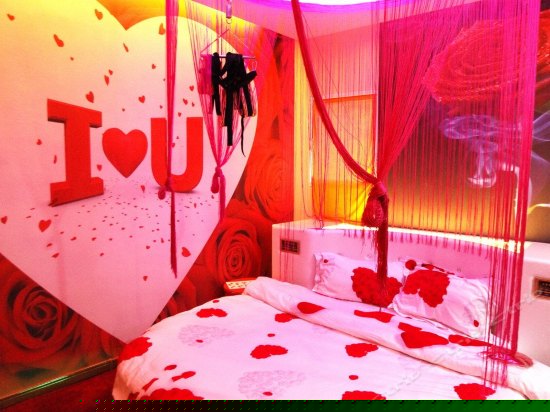 玫瑰之约主题圆床房